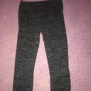 NEVER WORN!! Black leggings with gray specs.